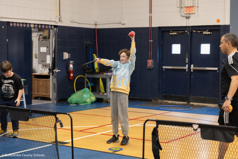 Student learning the fundamentals of pickleball.