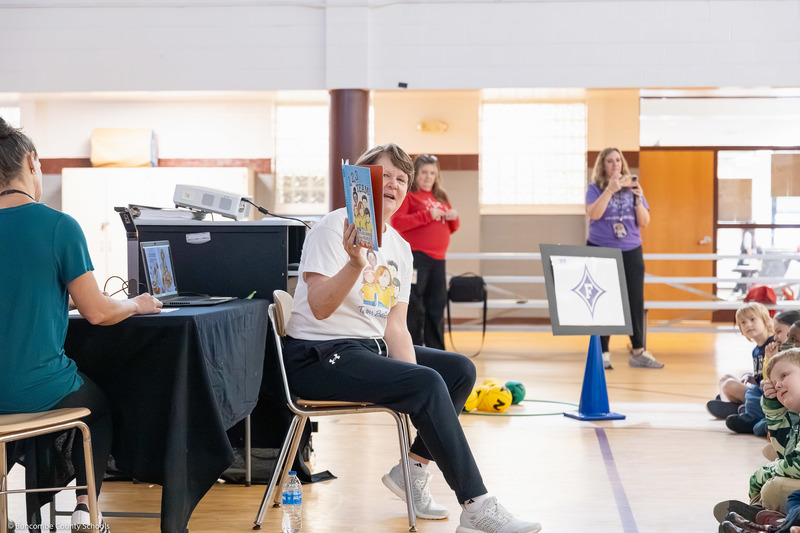 Susie Gardner reads to students.