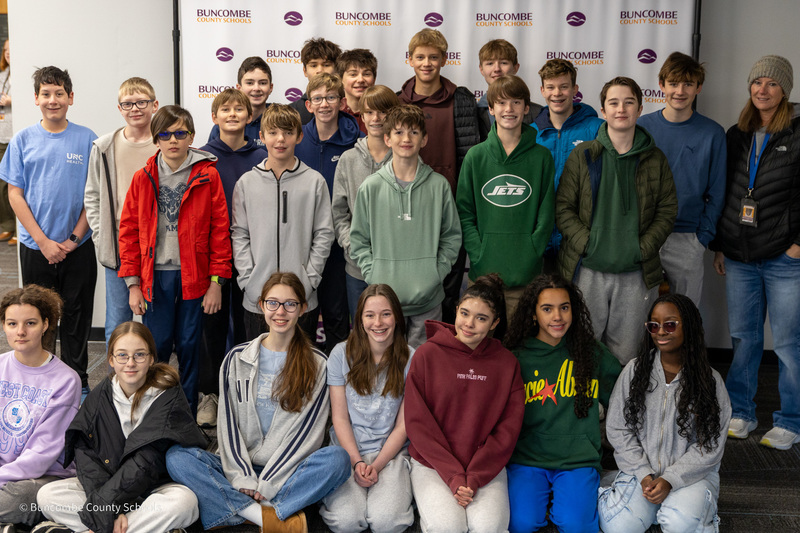 The Valley Springs MathCounts team poses for a photo in front of the Buncombe County Schools banner.