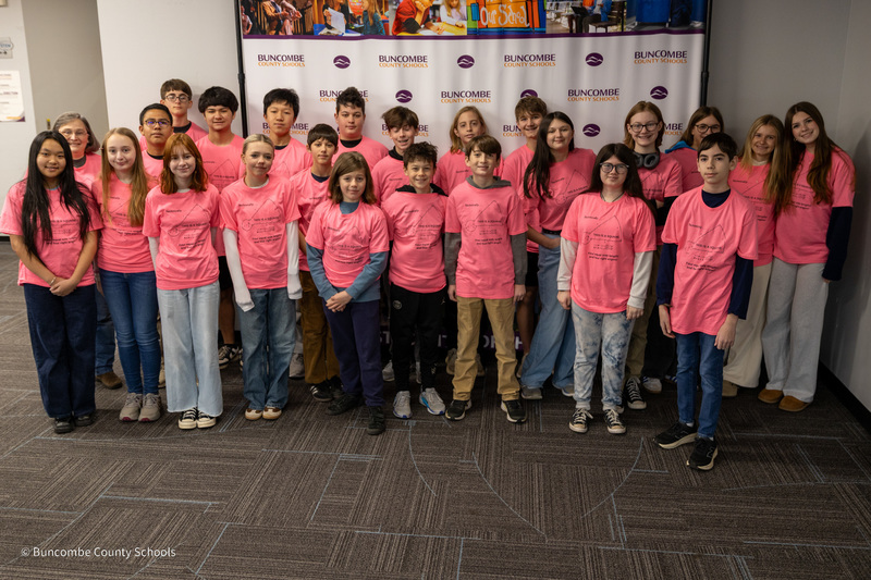 The Koontz MathCounts team poses for a photo in front of the Buncombe County Schools banner.