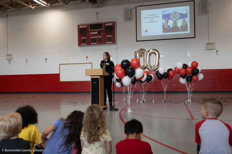 Dr. Bolado addresses the students from a podium