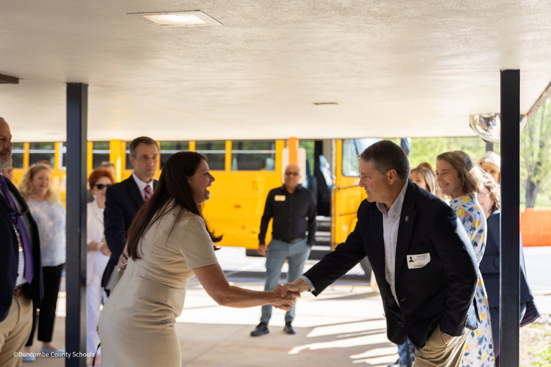 NC Sen. Warren Daniel shakes the hand of Glen Arden Elementary principal Laura Kirchner
