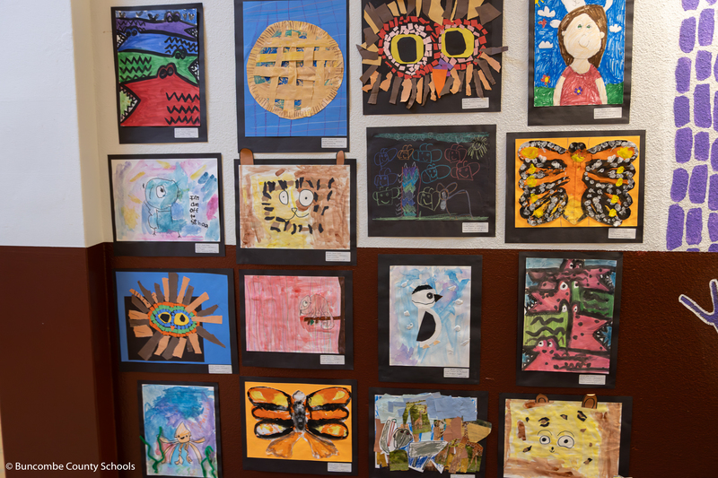 Photo of artwork hanging on the wall for families to see. 