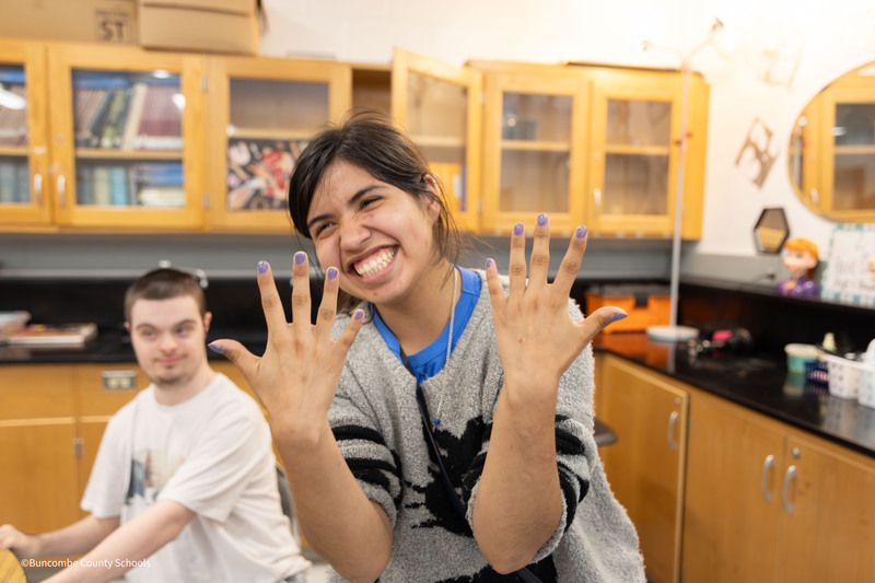 Student with her nails painted