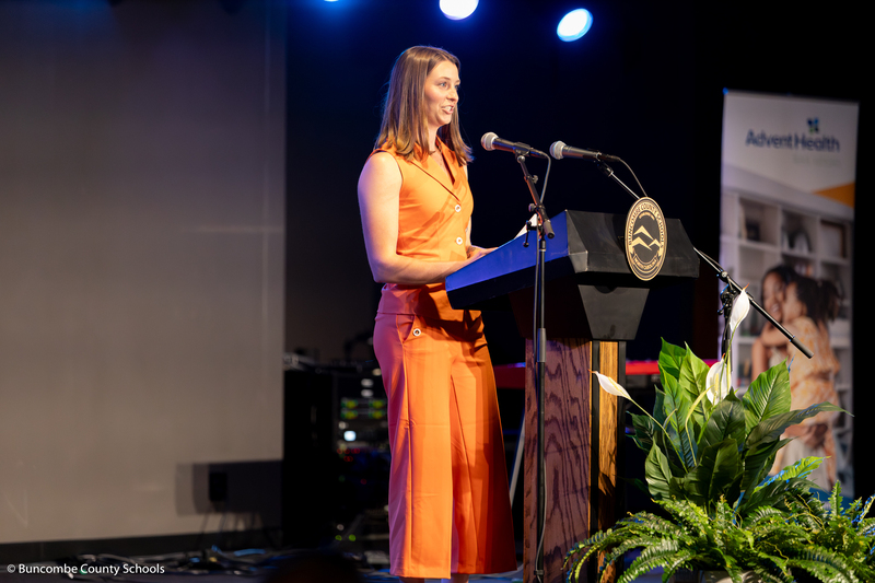Kinsley Kelly addresses the crowd standing behind the BCS podium.