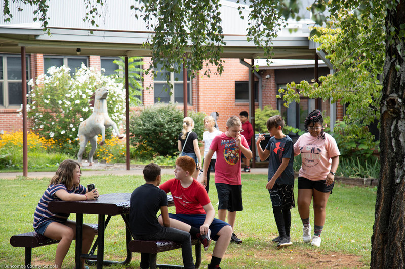 6th Graders socializing in the courtyard
