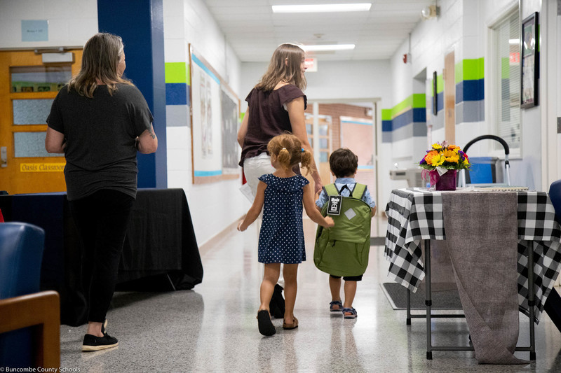 Students walking the halls for Meet the Teacher.