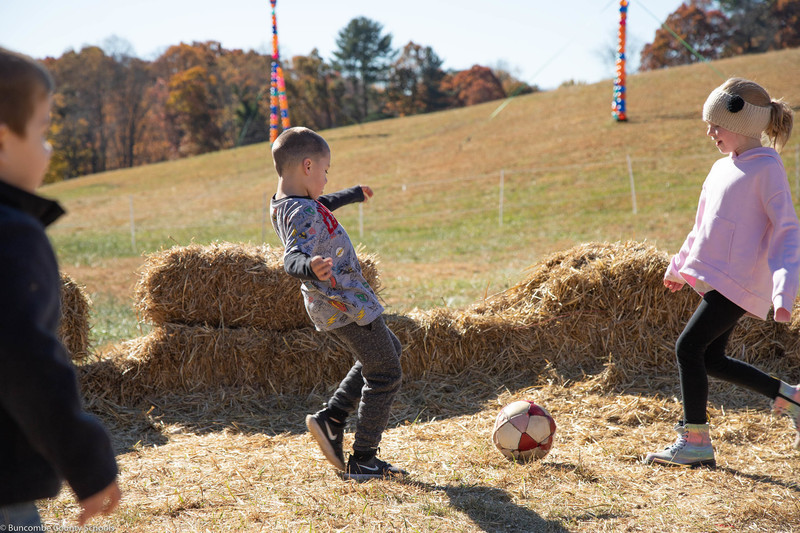 Students playing soccer. 