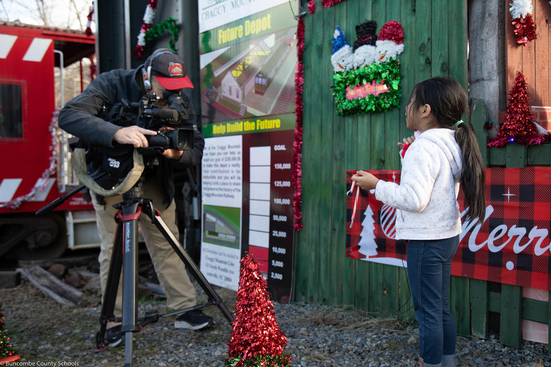 Student doing an on camera interview for WLOS News 13.
