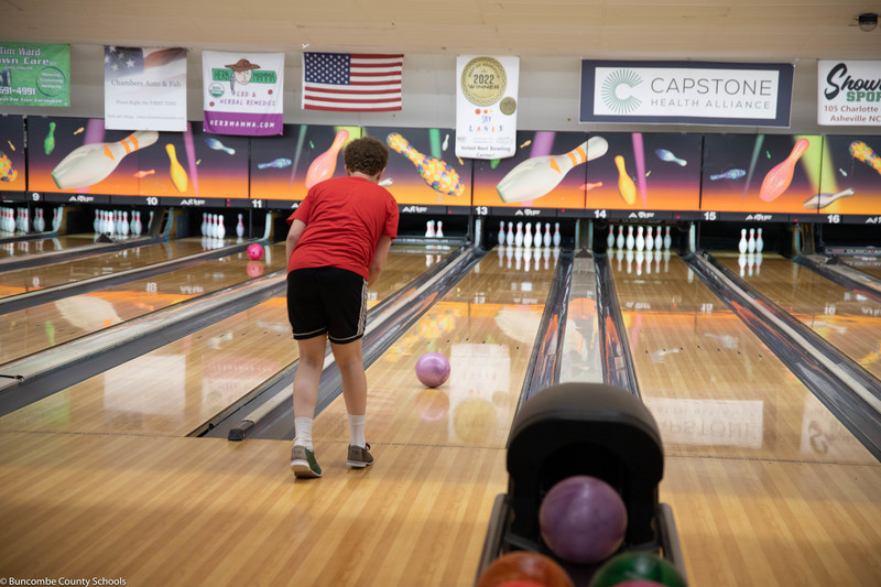 Student having fun at the bowling alley.