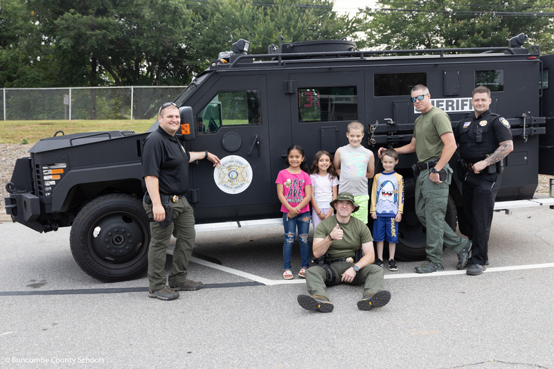 Students with the SRT car from the Buncombe County Sheriff's Office. 
