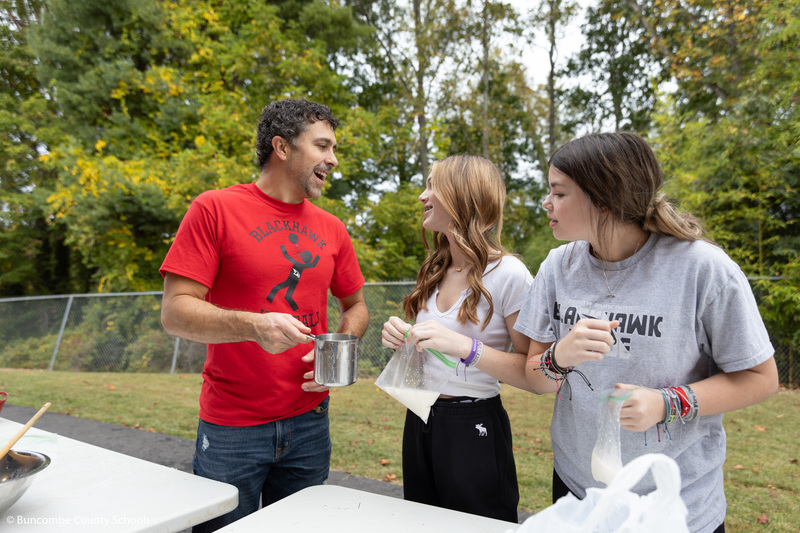 Mr. Rice and students preparing to make ice cream. 