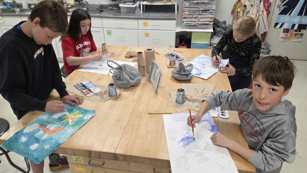 Table 4, 5K painting their koi and pond.