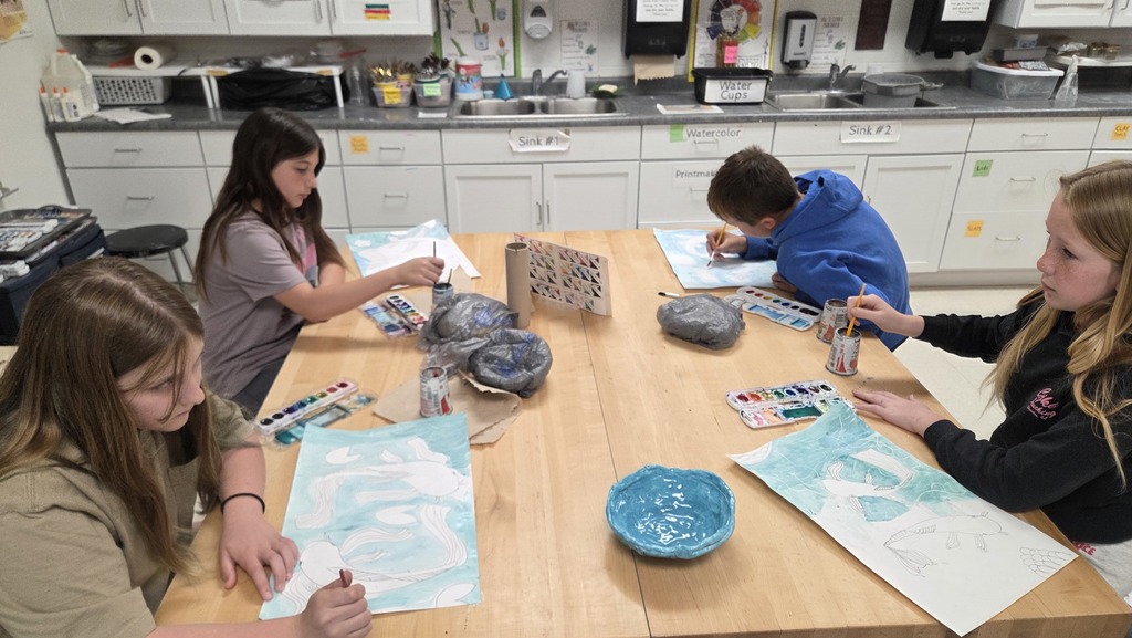 Table 3, 5K painting their koi and pond.