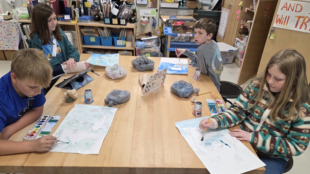 Table 1, 5K painting their koi and pond.