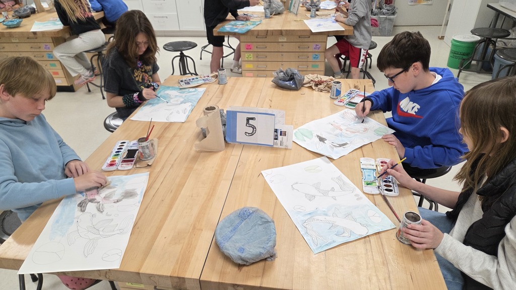 Table 5, 5K painting their koi and pond.