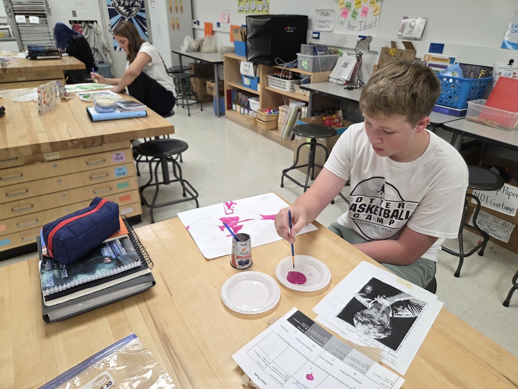 students painting