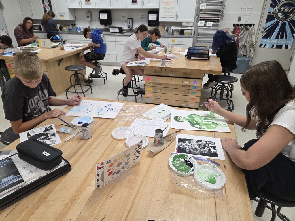 students painting