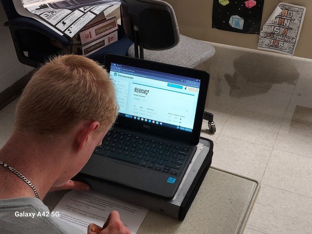 A student practicing online banking