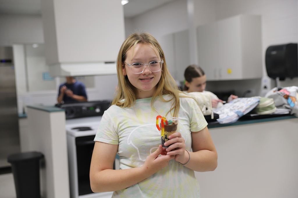Students in Mrs. Shimmin's Intro to Ag class have been working hard learning all about soil! Students learned about soil particle size, the makeup of soil, and the different horizons! To celebrate their learning students made their own Soil Profile Dirt Dessert! You could make your own soil profile at home with the following ingredients to represent each layer of soil:  Bedrock = 1 Whole Oreo Parent Materials = Crumbled Oreo & Butterscotch Chips Sub Soil = Crushed Graham Crackers Top Soil = Chocolate Pudding Organic Matter = Gummy Worms & Green Sprinkles  Who knew dirt could be so delicious?! 