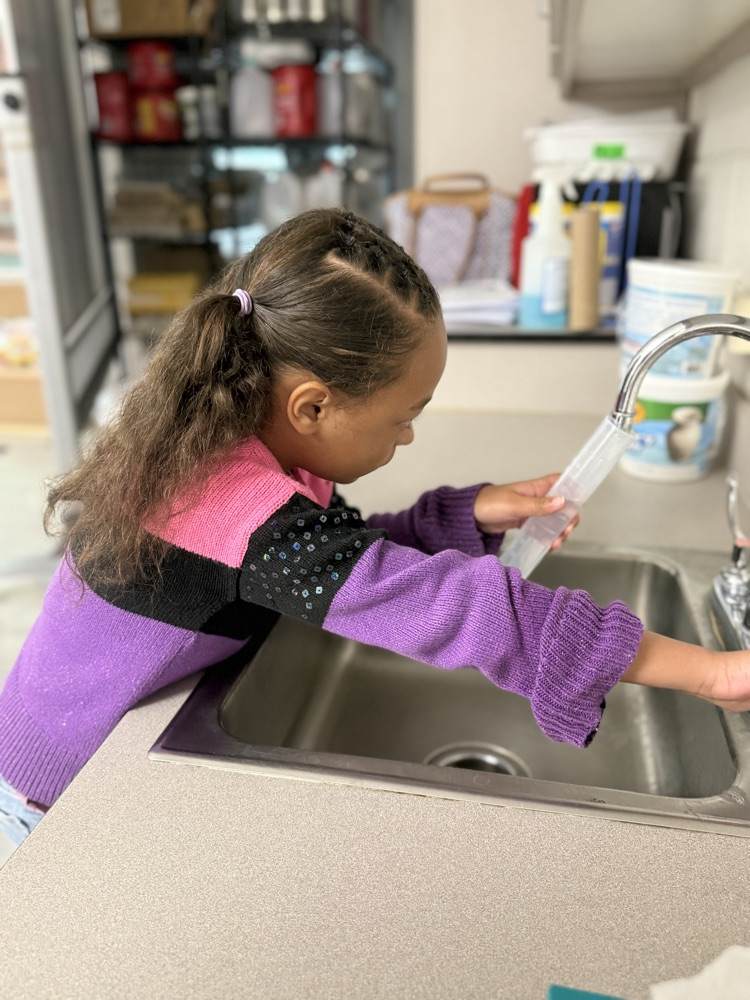 Second graders learn how to use graduated cylinders in STEM Class with Mrs. Morgan 
