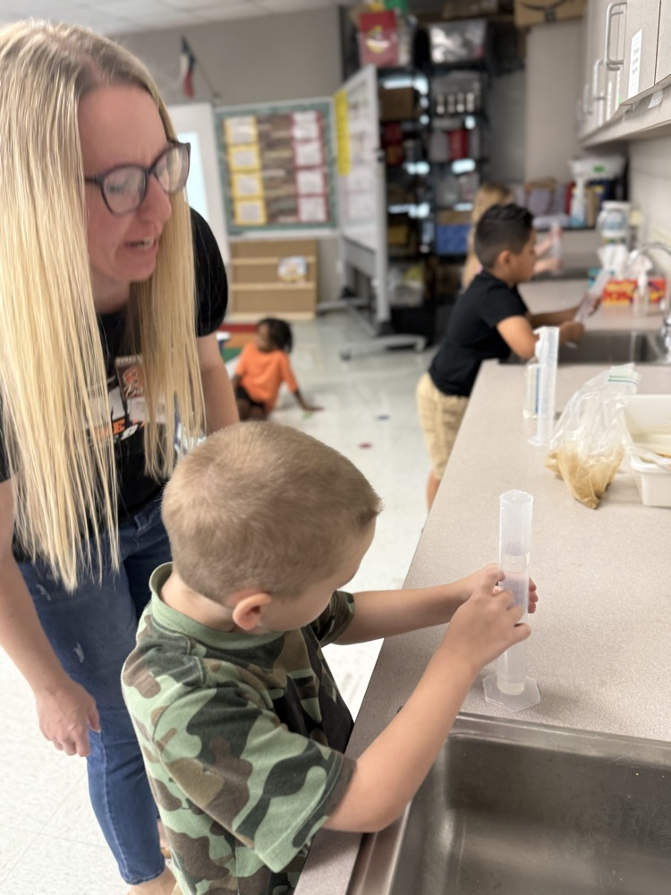 Second graders learn how to use graduated cylinders in STEM Class with Mrs. Morgan 