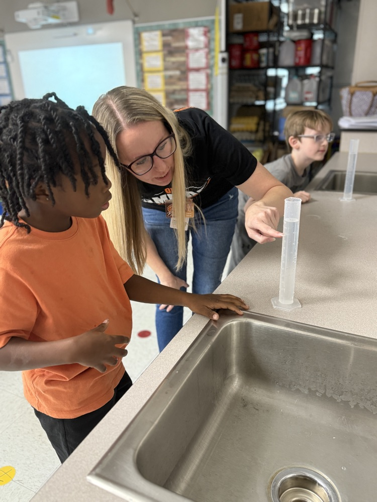 Second graders learn how to use graduated cylinders in STEM Class with Mrs. Morgan 