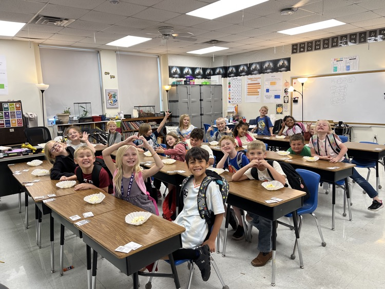 Mr. Roberto's class filled their smiley faces for good behavior and earned a popcorn party!