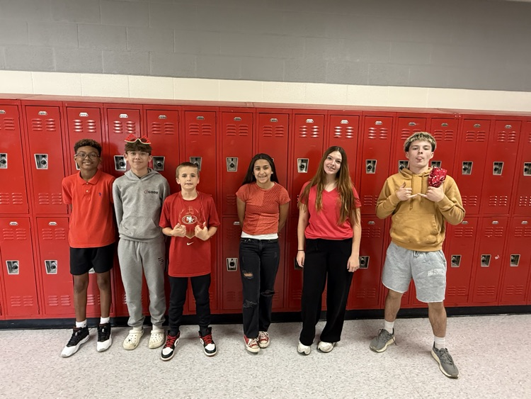 students wearing red