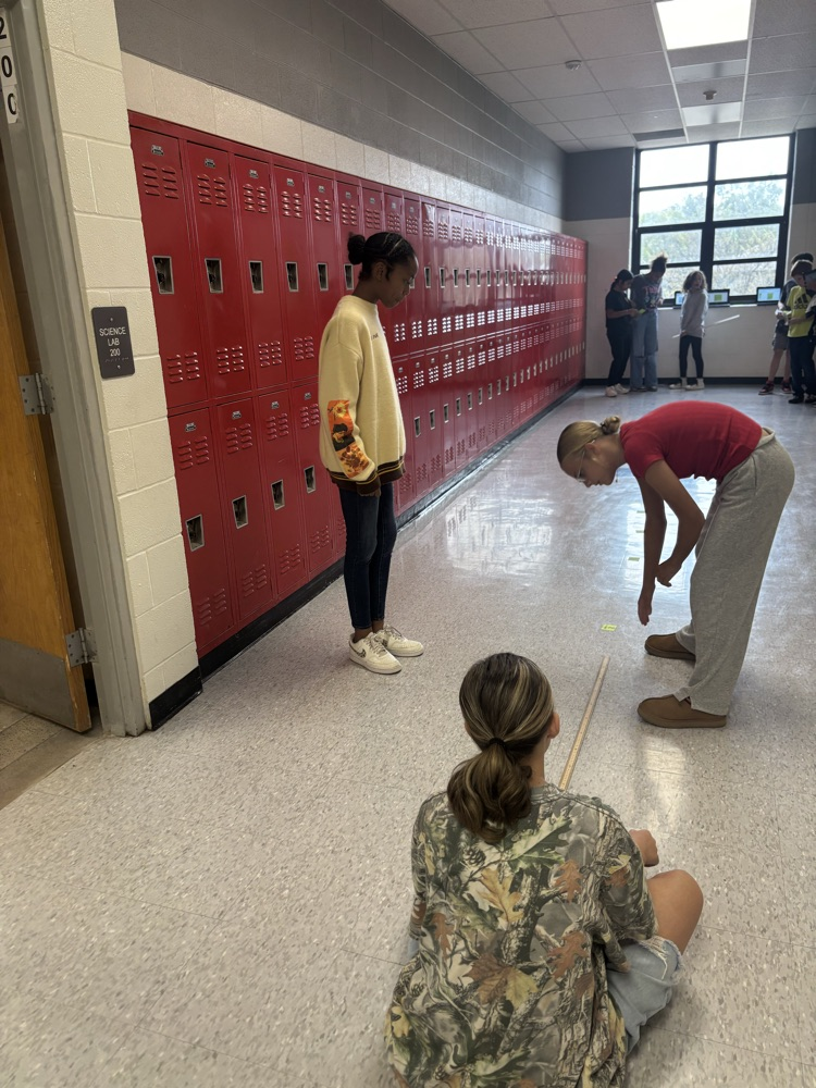 students measuring