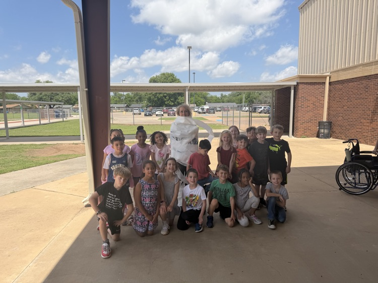 These teachers got wrapped like a mummy because their classes made one of the class goals! Great job! 
