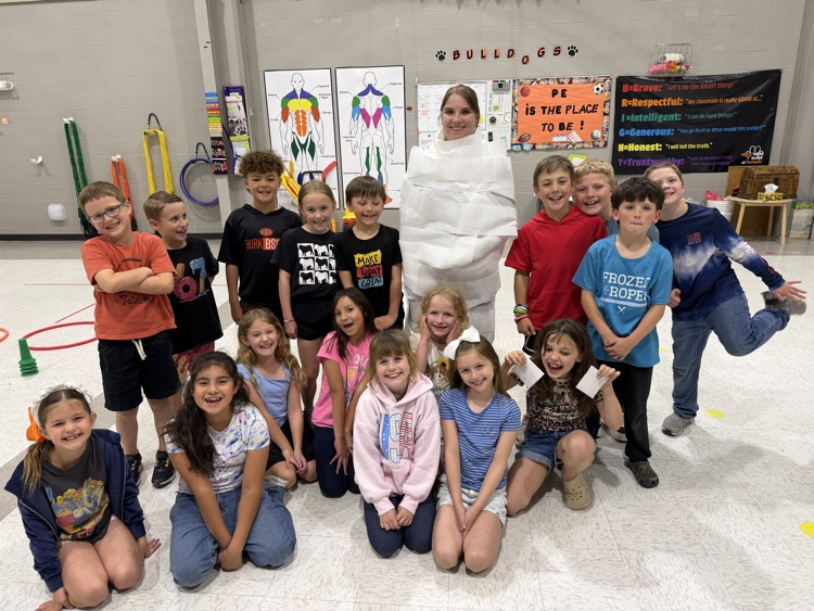 These teachers got wrapped like a mummy because their classes made one of the class goals! Great job! 
