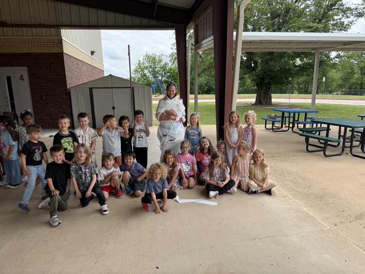 These teachers got wrapped like a mummy because their classes made one of the class goals! Great job! 