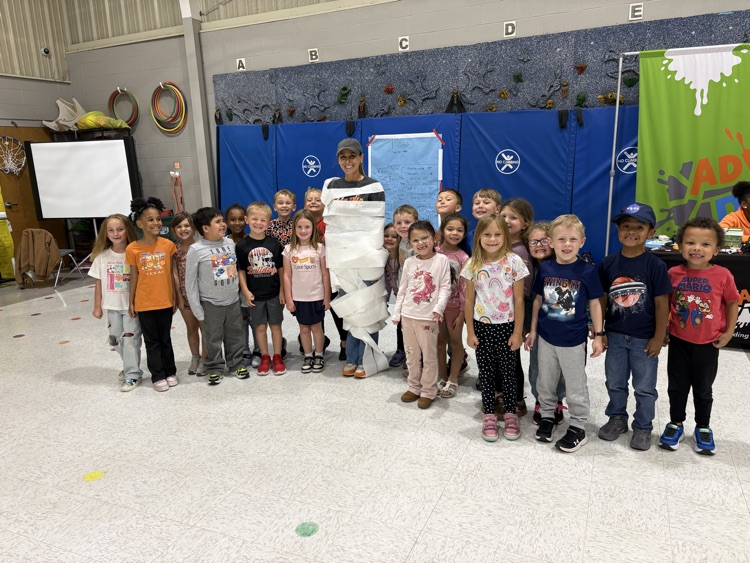 These teachers got wrapped like a mummy because their classes made one of the class goals! Great job! 