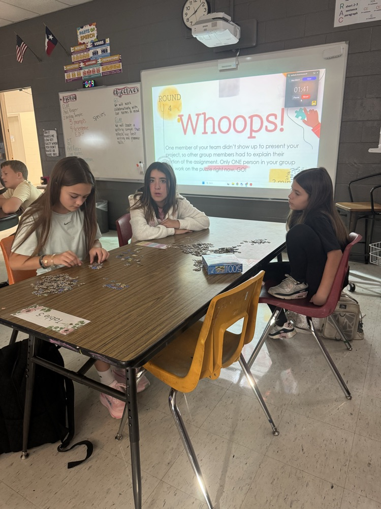 Students completing puzzles