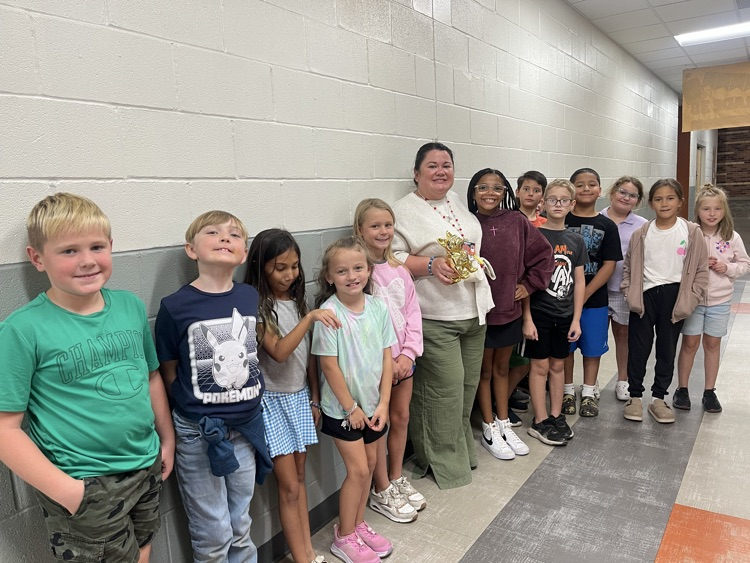 Mrs. Denson received the Golden Bulldog from Mrs. White today!