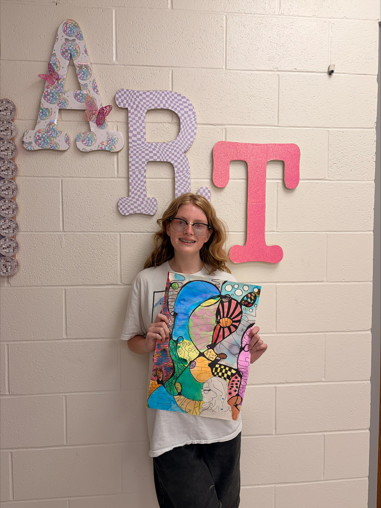 student with artwork