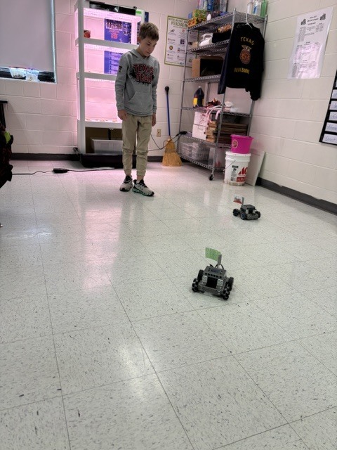 students working on robot