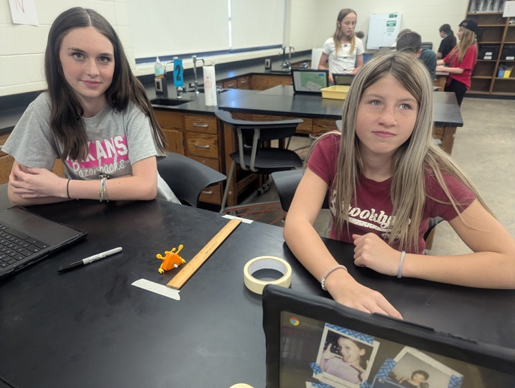 students completing science lab