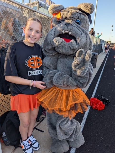 cheerleader with mascot