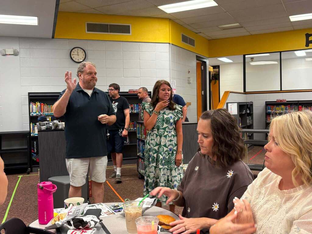 Valdese tiger staff enjoying lunch provided by chick fil a
