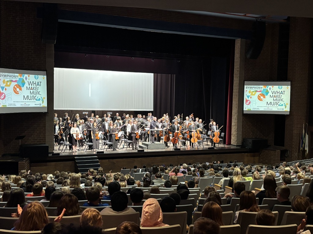 students watch symphony perform on stage at the COMMA