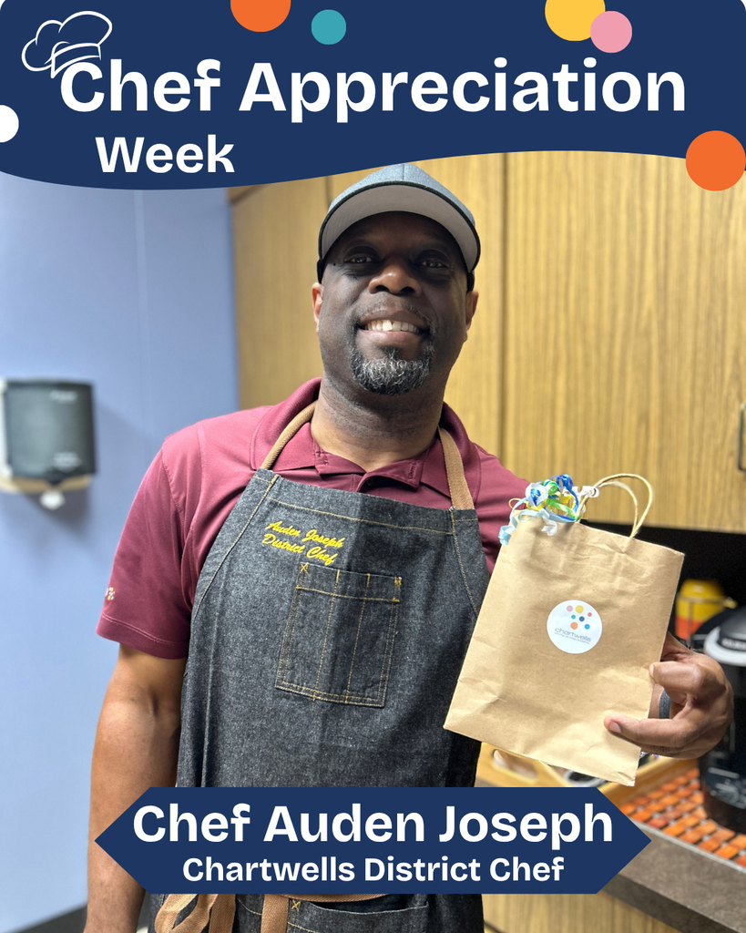 chef appreciation week chef auden joseph chartwells district chef. Chef is posing with a new apron and a gift bag