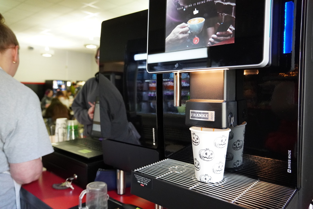 close up of a coffee being made at the coffee machine