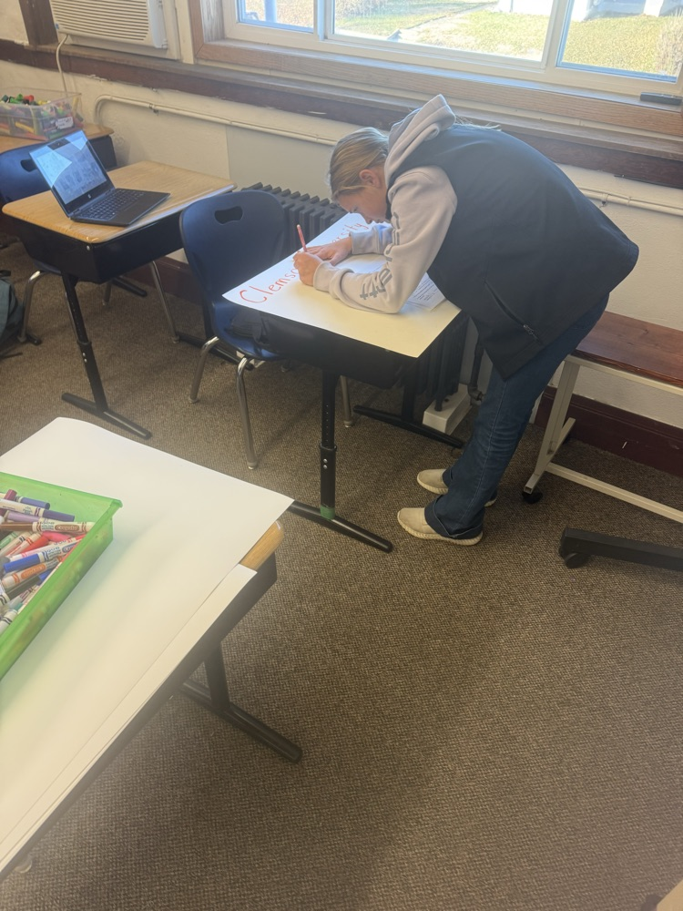 Working her poster board.