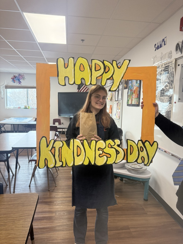 Abbie, enjoying a bag of popcorn .