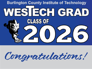 Blue sign with white lettering reads WestTech Grad Class of 2026 