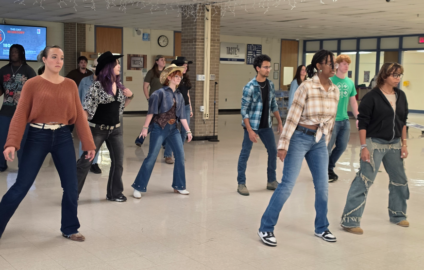 Students line dancing.