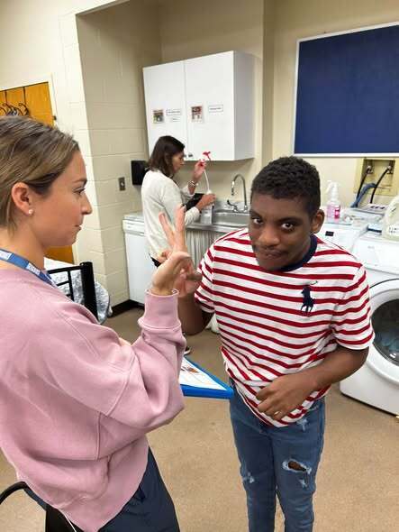 Transition teacher working with student