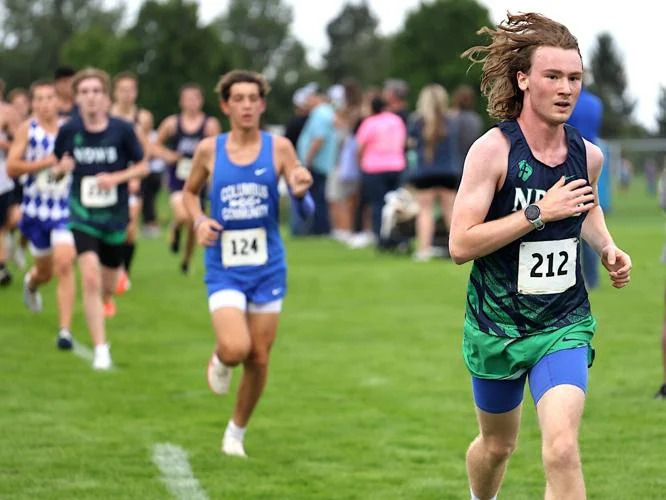 ND"s Liam Haeger (212) runs in the Grayhounds Invite in Burlington